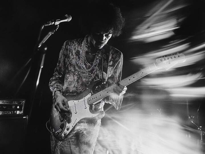 Jimi Hendrix playing guitar