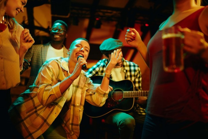Happy people playing and singing